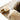 Cozy chestnut sheepskin slippers with plush wool lining placed on a textured woven rug beside a soft sheepskin throw, showcasing the warmth, comfort, and natural luxury of genuine sheepskin products from kiwi sheepskins