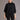 A model wearing a color charcoal merino poncho with a diagonal detail and asymmetric neckline from kiwi sheepskins, perfect to partner with dark color apparel