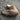Pair of brown Sheepskin Slippers with fluffy interior made of sheepskin wool on a concrete surface #color_sand