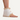 A medical sheepskin heel/Elbow pad worn on the lower leg and foot, showing the soft sheepskin lining.